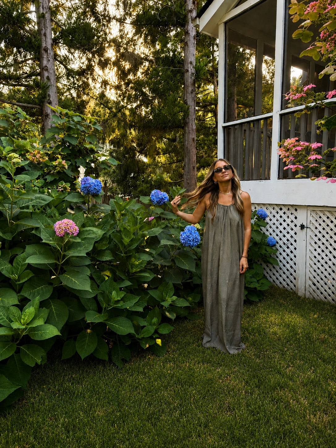 Olde Southwick founder in a hydrangea garden